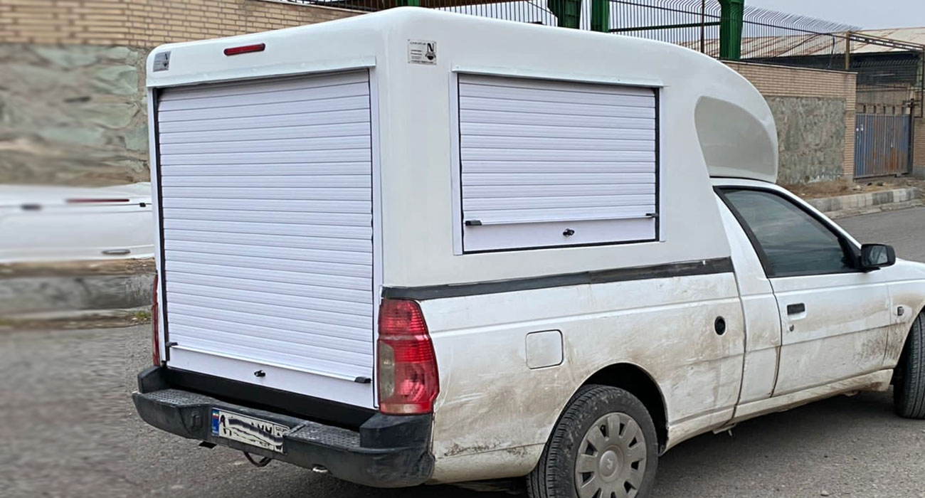 اتاق عقب آریسان درب کرکره ای | آرین صنعت رزین خودرو | تولید کننده انواع اتاقک های فایبرگلاس